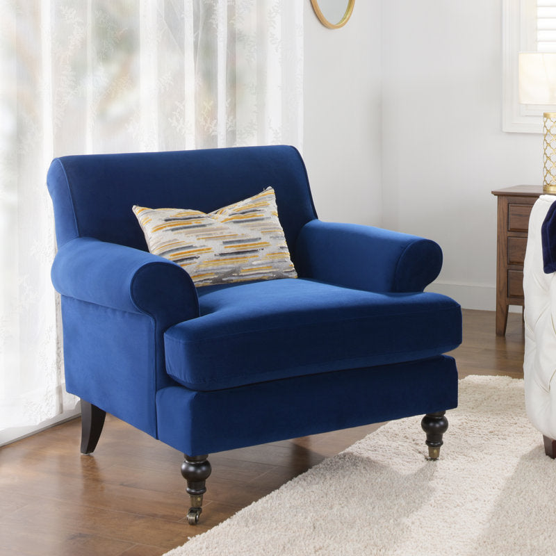 Handmade teak wood accent chair with velvet upholstery
