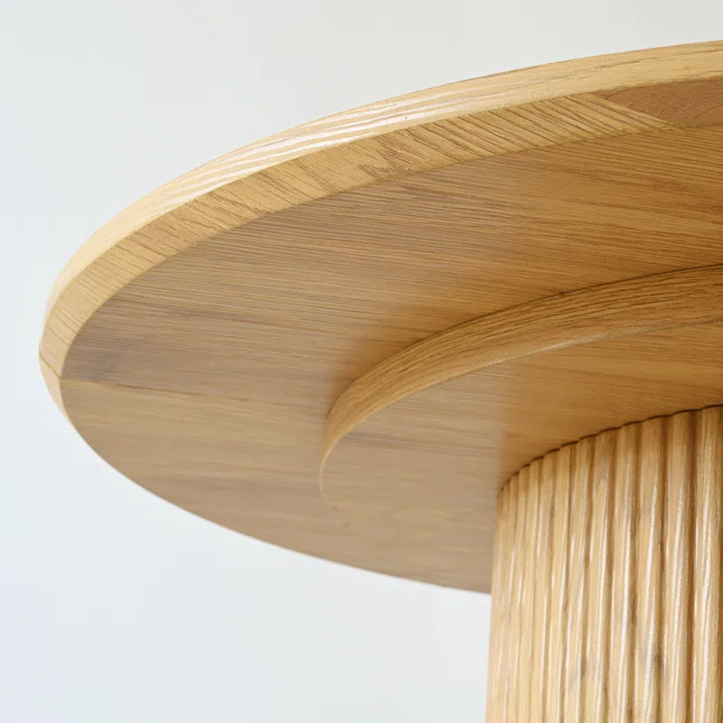Oval dining table setup with modern chairs