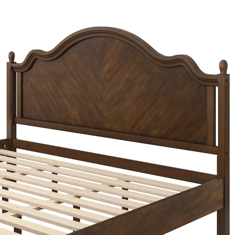 Queen size solid wood bed with neutral bedding