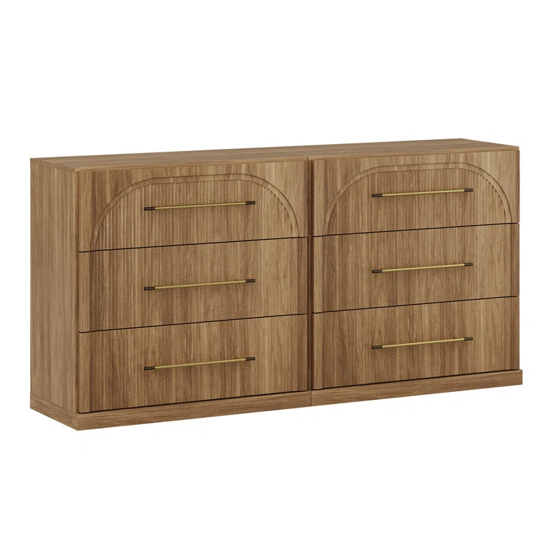 Modern fluted wood dresser with brass handles for bedroom storage
