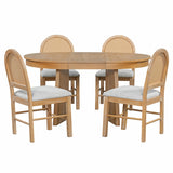 Modern teak wood dining table with cushioned cane back chairs