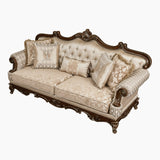 Premium beige upholstered teak wood sofa with carved detailing