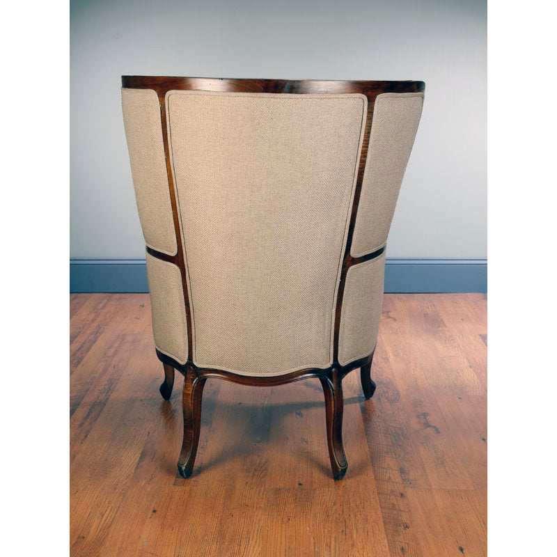 elegant wingback lounge chair with teak wood legs