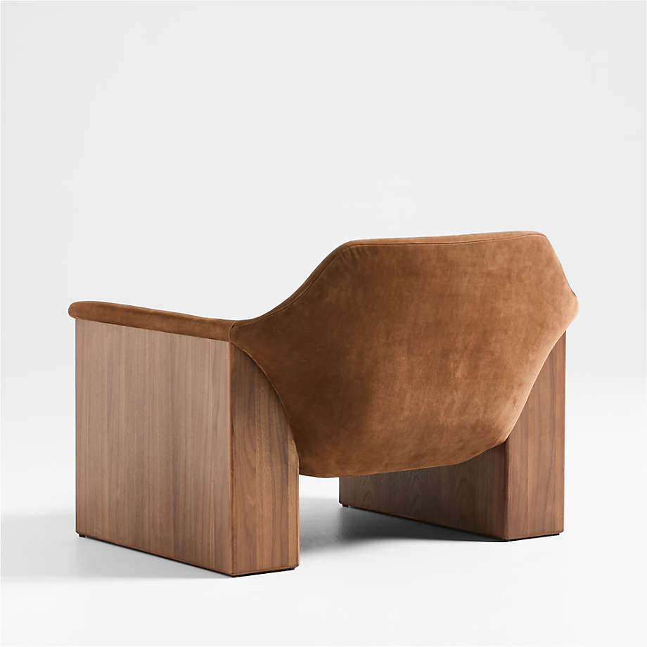 Comfortable teak wood lounge armchair with curved arms