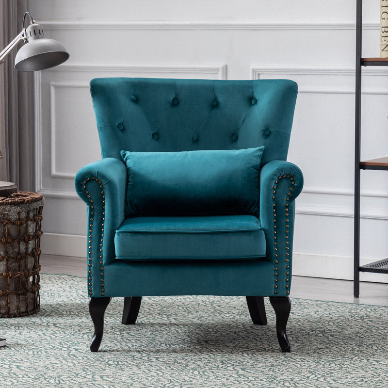 Luxury teal blue upholstered lounge chair with tufted backrest