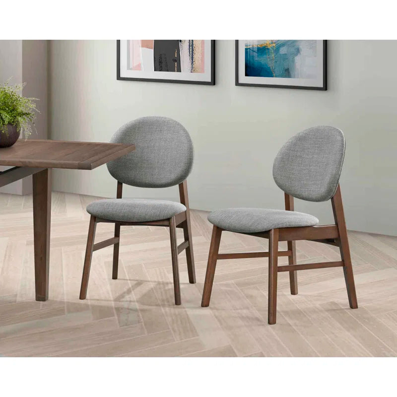 extendable dining table with upholstered chairs