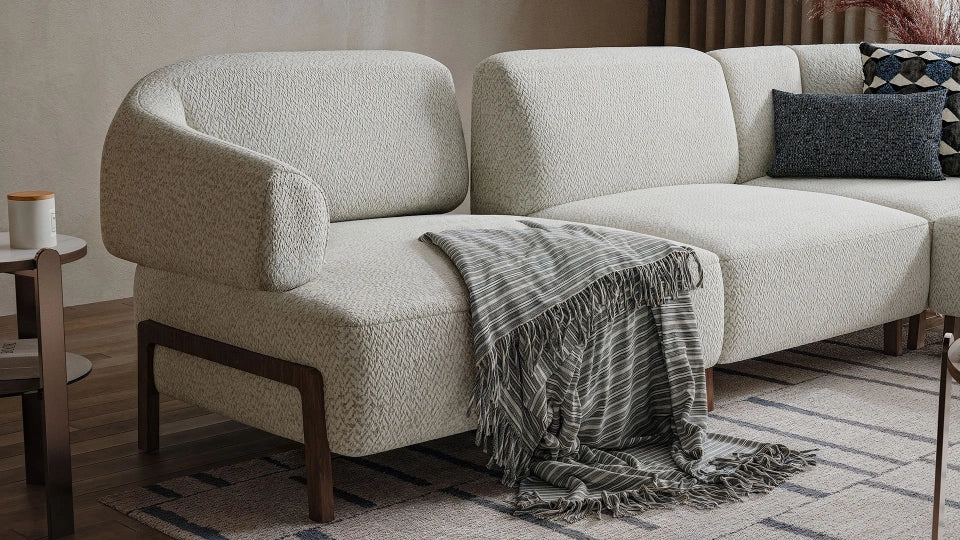 Contemporary curved living room sofa in cream boucle fabric