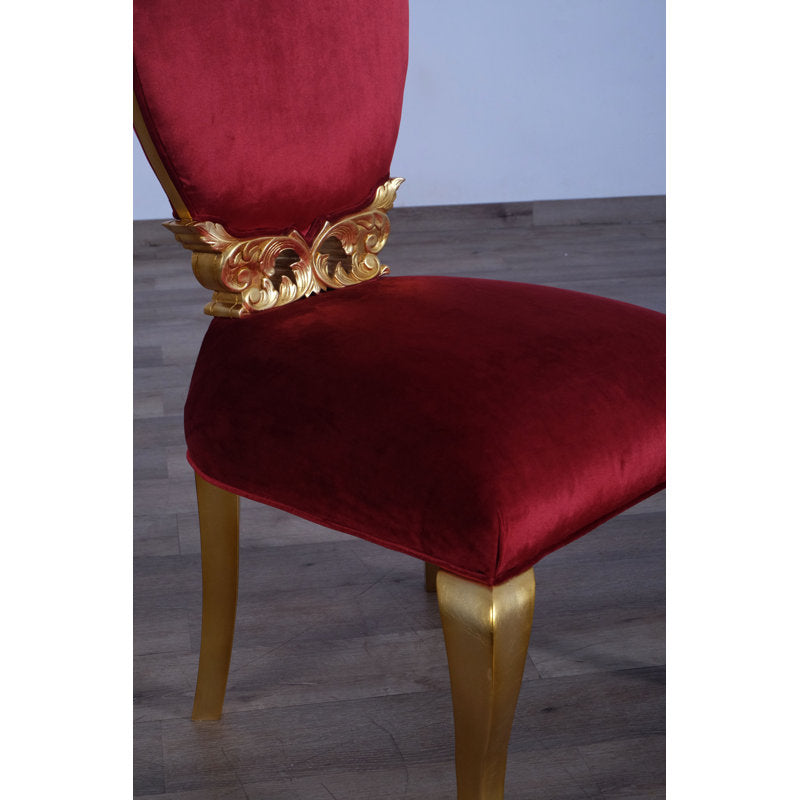 Handmade teak wood dining table with velvet upholstered chairs