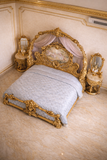 Luxury gold bedroom set with matching bedside tables
