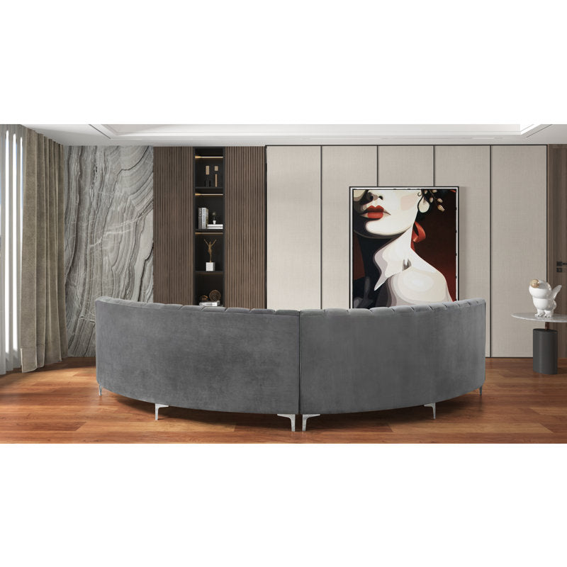 Comfortable curved lounge sofa with plush cushions