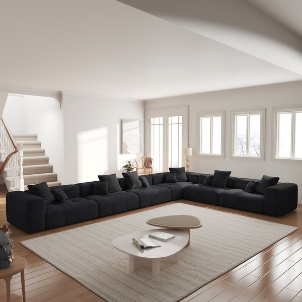 Elegant black L shape sofa for spacious homes