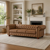 Brown teak wood Chesterfield sofa with deep button tufting