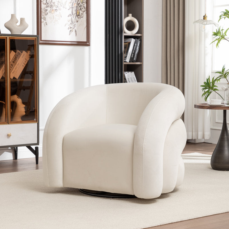 Contemporary curved barrel chair with soft upholstery and teak wood frame
