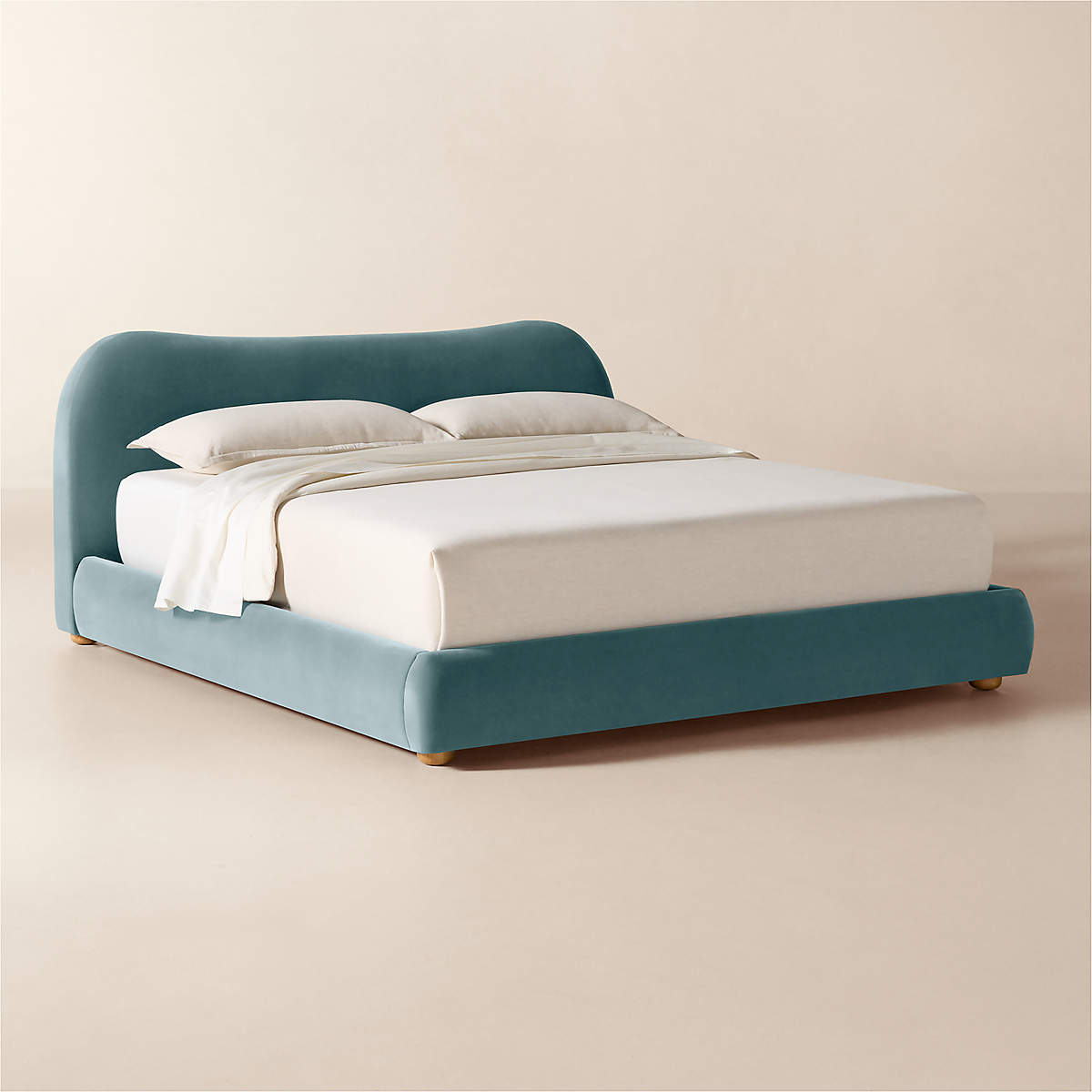 Elegant curved headboard teal bed