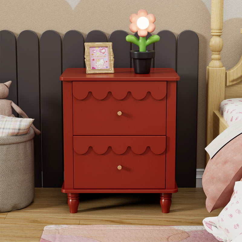 Red wooden nightstand with elegant scallop detailing
