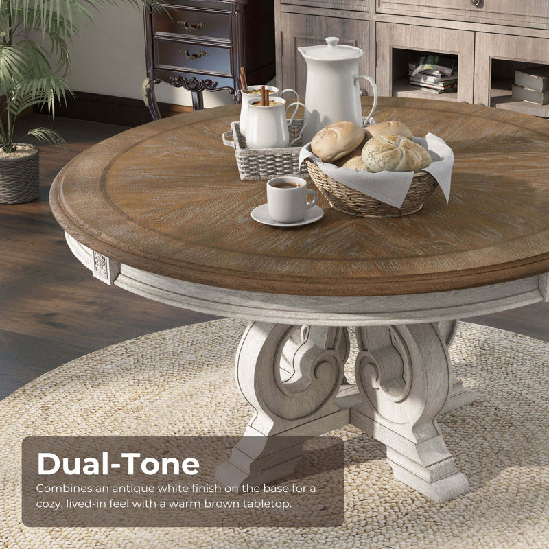 Round teak dining table with comfortable fabric chairs