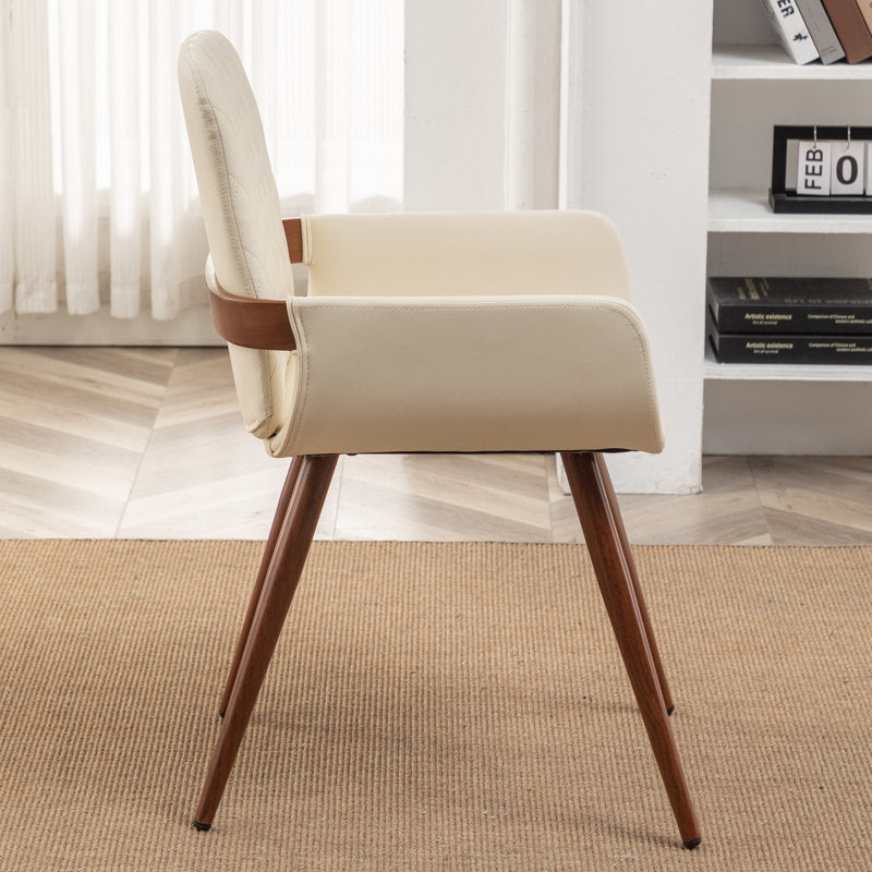 Elegant wooden dining table with cushioned chairs