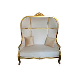 Luxury handcrafted solid teak wood wingback sofa in cream fabric with royal gold finish by Sky Rise Decor