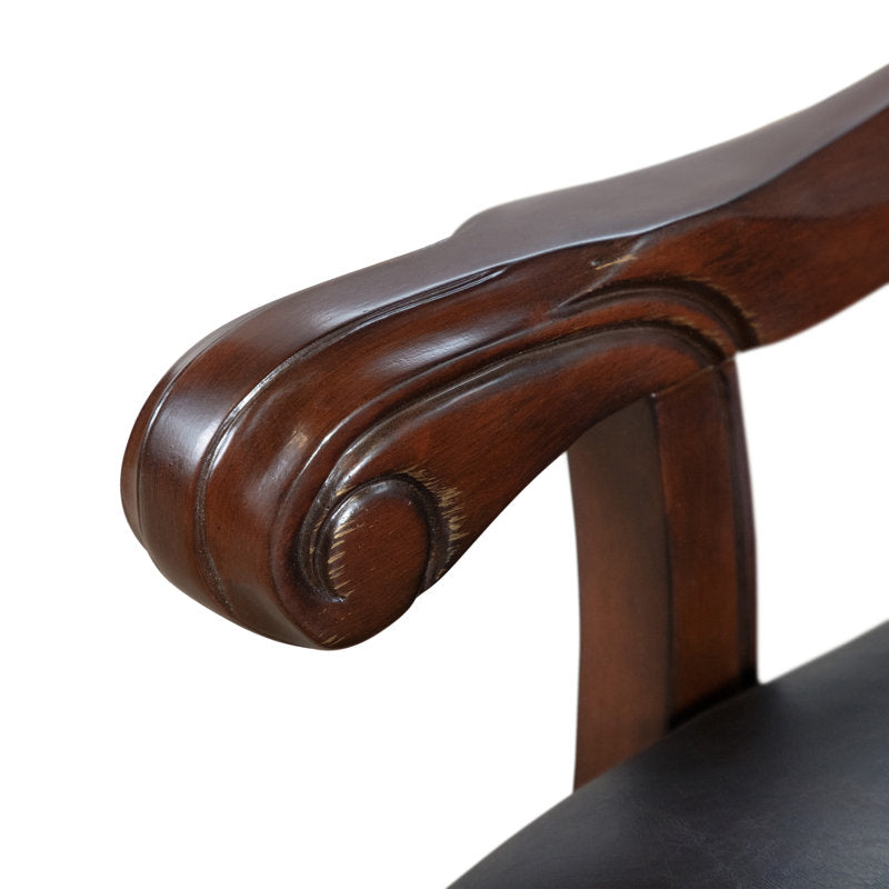 Wooden dining table with carved pedestal base