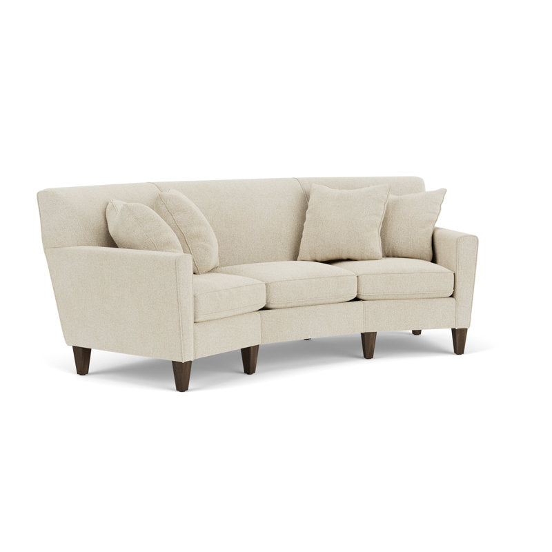 Contemporary upholstered teak wood couch with cushions