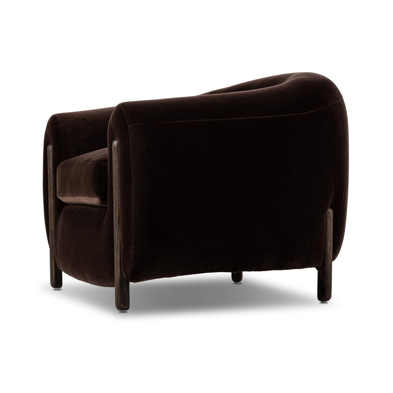 Modern curved lounge chair with teak wood frame