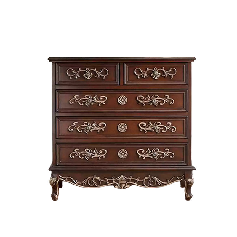 Traditional teak wood storage cabinet with decorative carved drawers