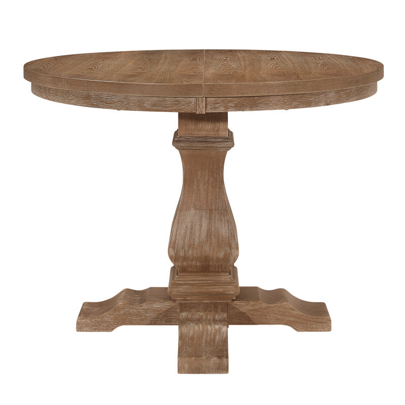 Luxury round wooden dining table with patterned chairs