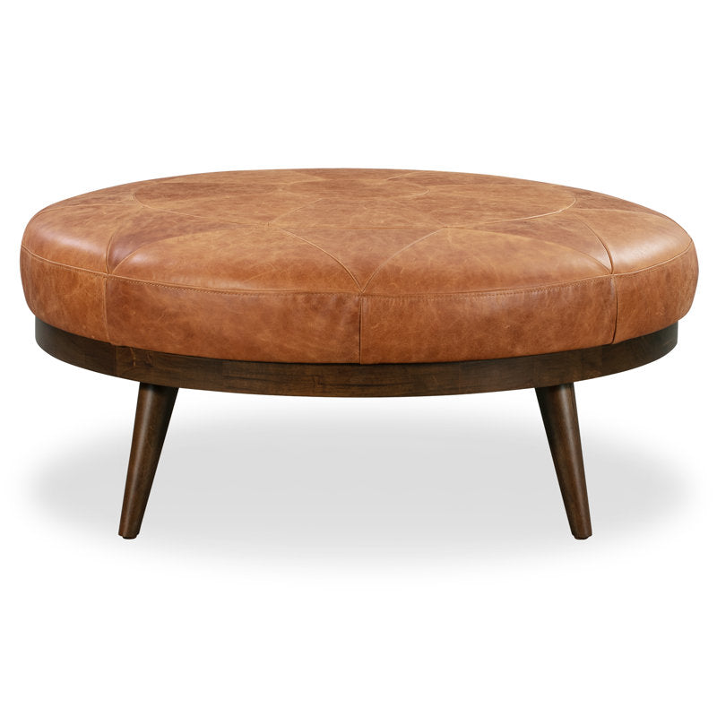 Handcrafted leather ottoman coffee table with wooden legs