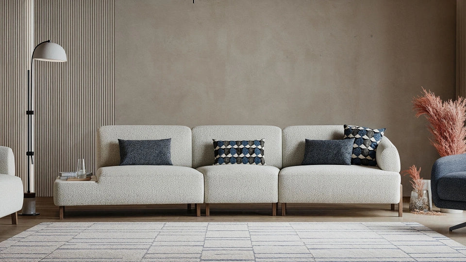 Curved modern living room sofa in cream upholstery