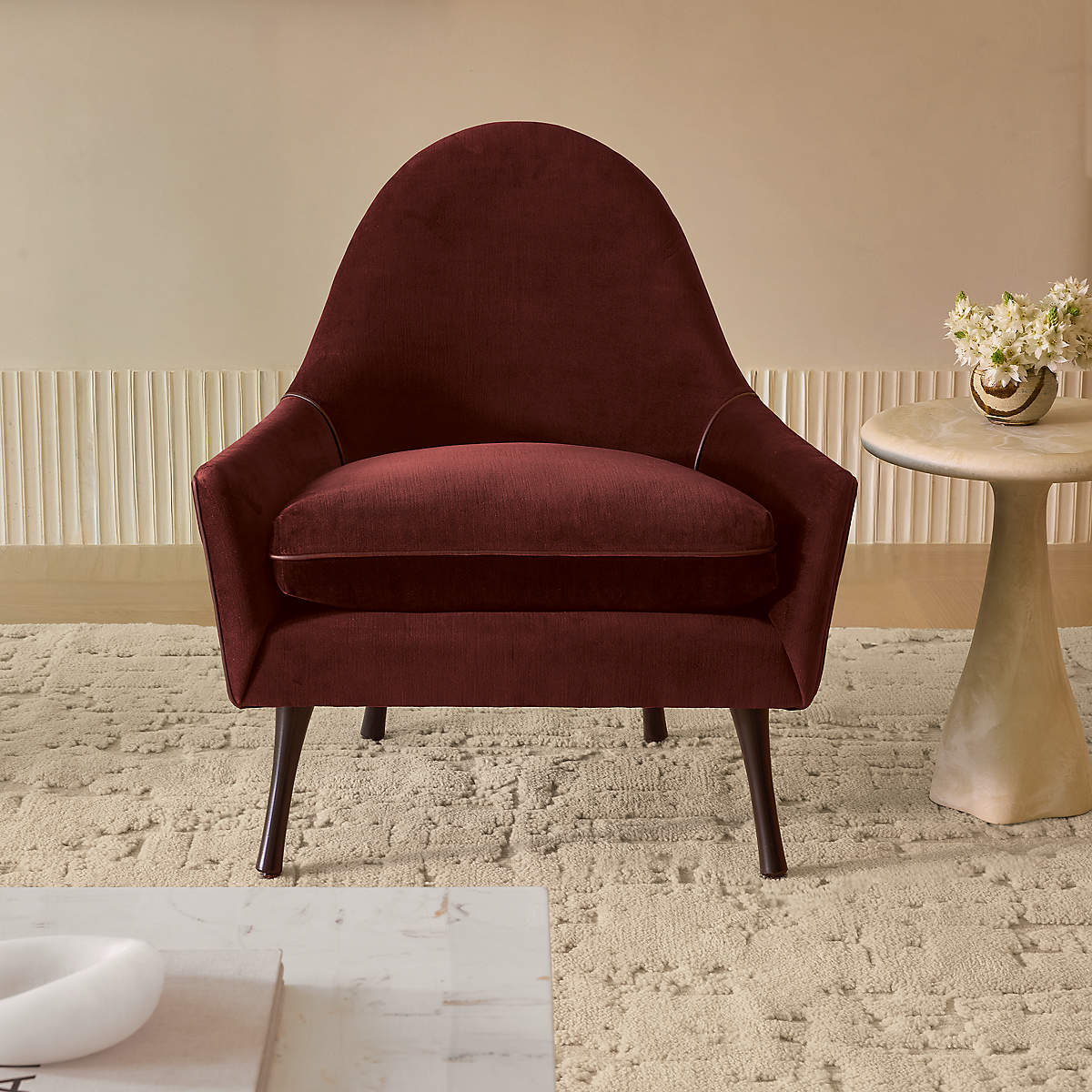 Premium teak wood lounge chair with velvet upholstery