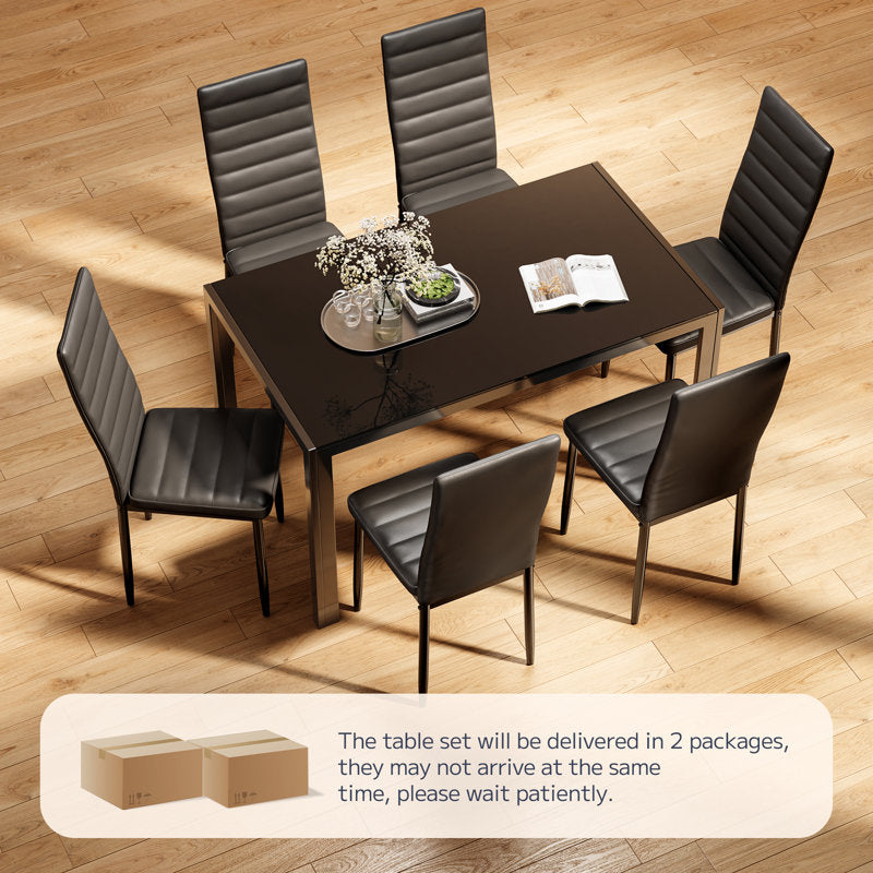 Contemporary dining room setup with black dining set