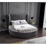 modern circular bed with velvet tufted design