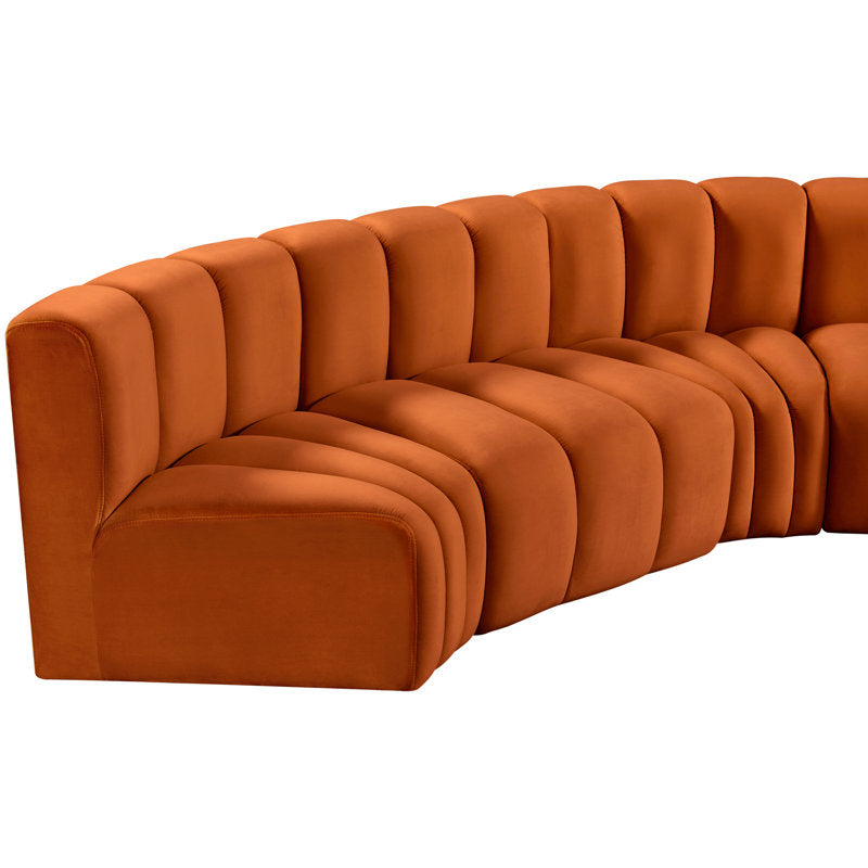 Designer serpentine sofa with premium upholstery