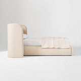 Elegant teak wood bed with padded headboard