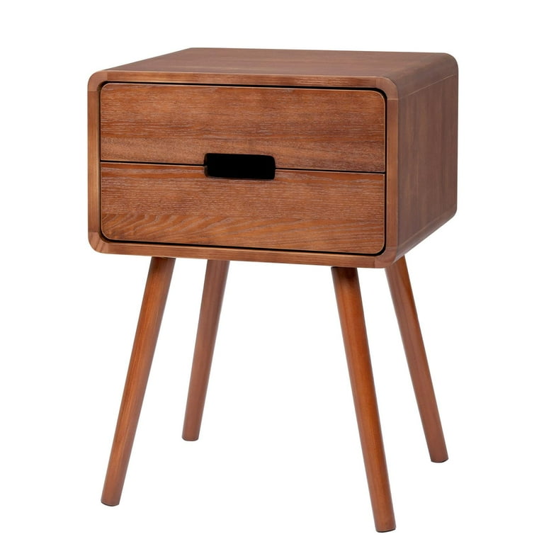 Modern bedside table with plant and lamp
