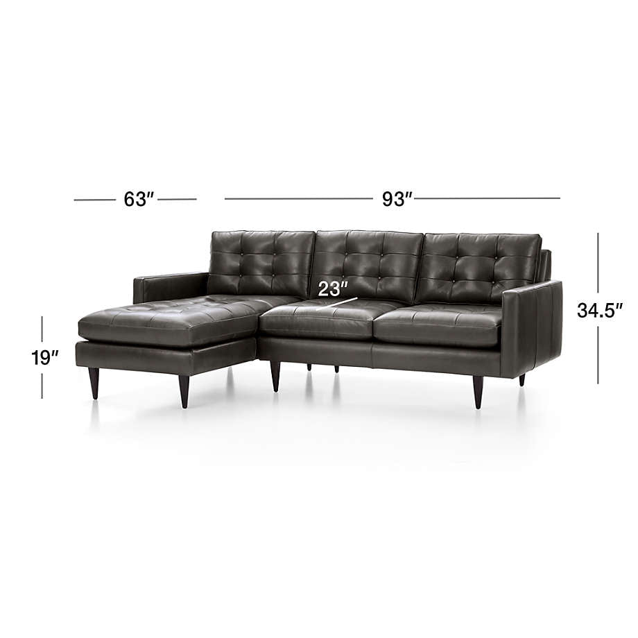Comfortable L-shaped sofa with chaise lounge and modern tufted design.