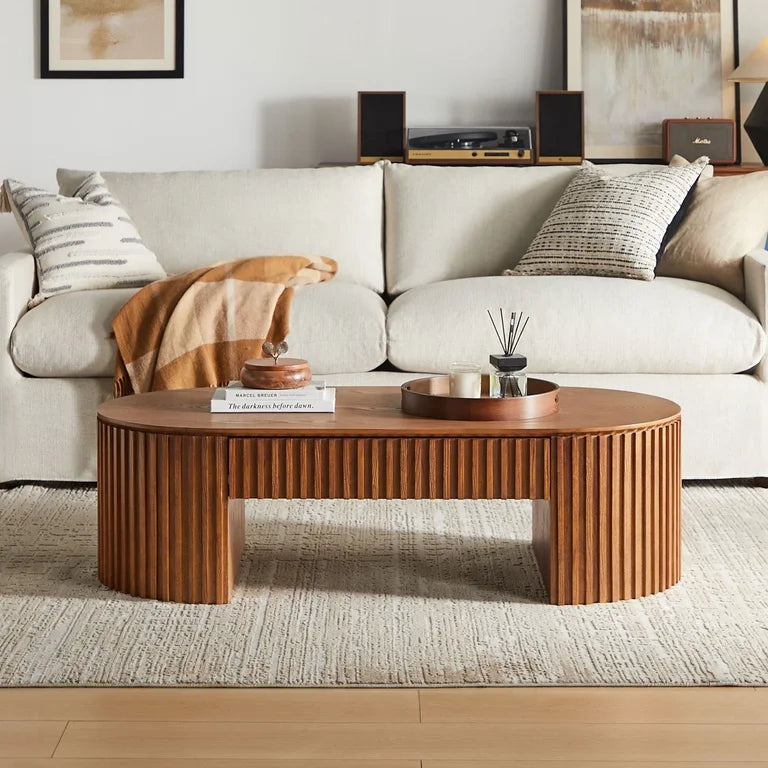 Oval wood coffee table with modern architectural base