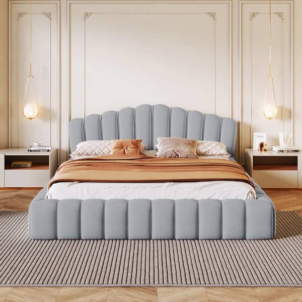 Cream fabric bed with vertical channel tufting