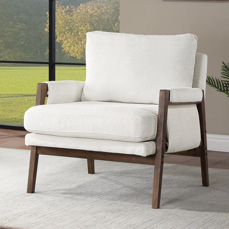 modern lounge chair with teak wood arms and cream cushions
