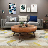 Luxury brown leather upholstered ottoman with solid teak wood base