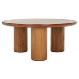 Modern round walnut coffee table with sculptural pedestal legs