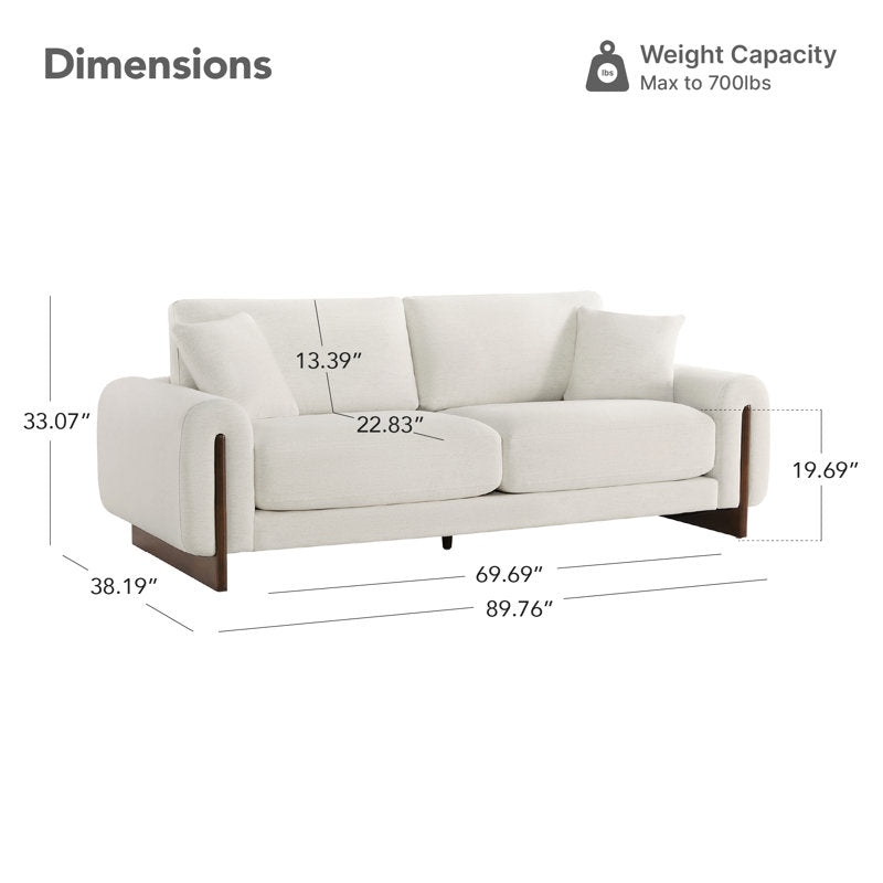 Comfortable ivory fabric couch with durable teak wood construction