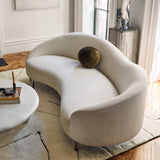 Contemporary cream fabric sofa with curved backrest