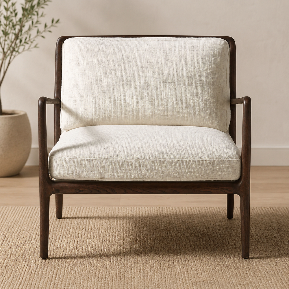 Modern teak wood lounge chair with cream upholstery