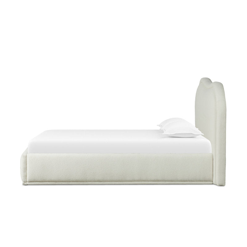 Modern upholstered platform bed with curved headboard