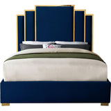 Contemporary luxury bedroom bed with royal blue velvet upholstery.