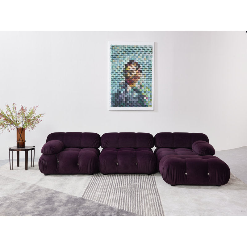 Premium modern sectional sofa with solid teak wood frame and deep tufted velvet cushions.