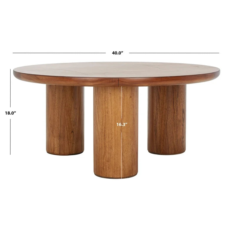 Sculptural wood coffee table with round top and pillar legs
