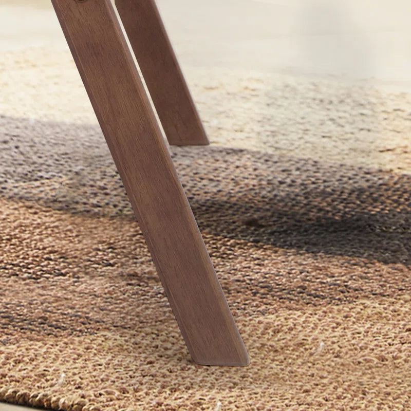 Modern wooden lounge chair with brown upholstery