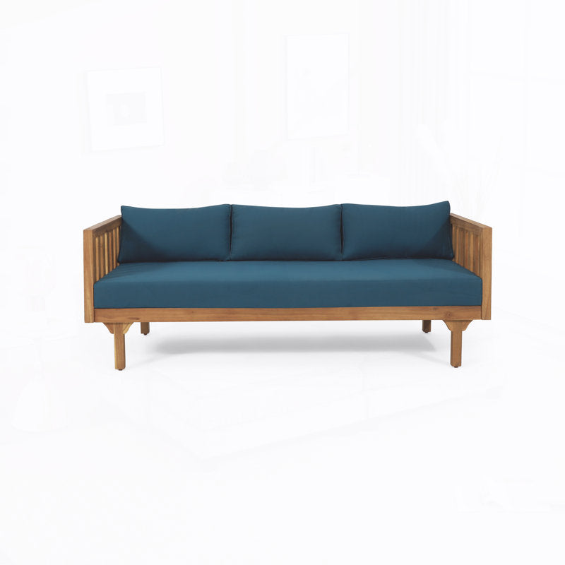Modern wooden sofa with dark gray cushions in minimalist living room
